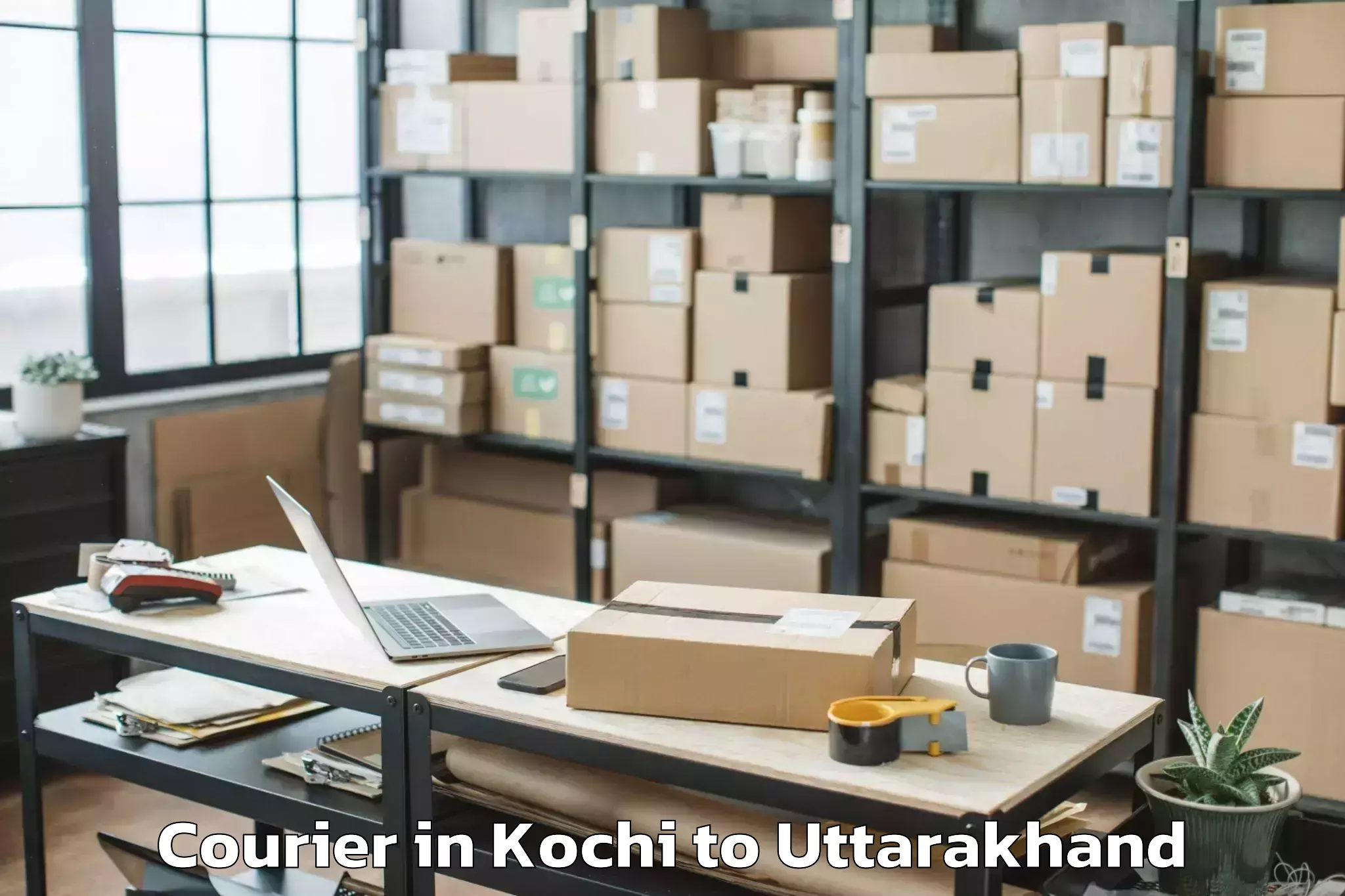 Book Kochi to Uttarakhand Aawasiya Vishwavid Courier Online